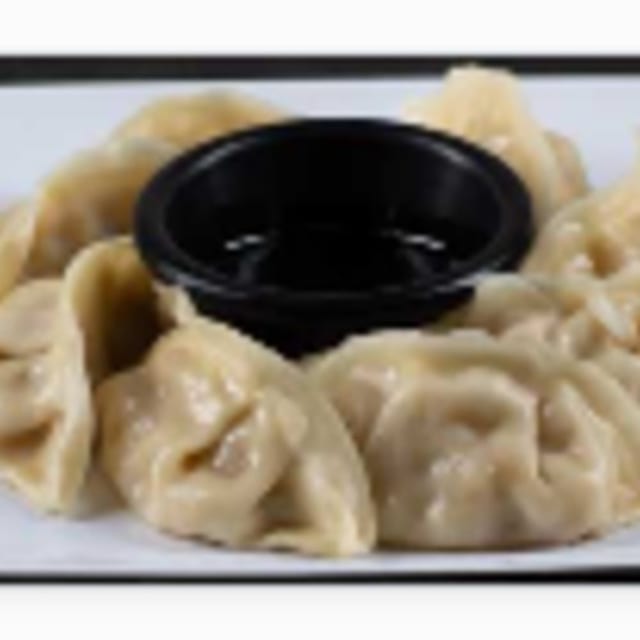 A8: Steamed Dumpling (Chicken) - Banh XEP Ga.